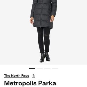 The North Face Black Puffer Jacket with Hood and Water-Resistant Material